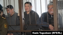 Трое из 45 подсудимых по "Хоргосскому делу". Алматы, 11 марта 2014 года.