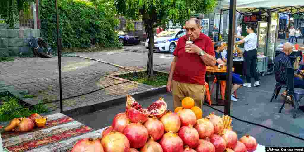 A Yerevan local slurps fresh juice through a bamboo straw. Gasparian told RFE/RL that he&rsquo;s selling up to 100 straws per week. But with the buzz they are beginning to create on social media, he said he is looking into planting his own bamboo to ensure a regular supply.