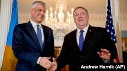 U.S. Secretary of State Mike Pompeo (right) meets with Kosovar President Hashim Thaci at the State Department in Washington on February 26.
