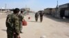 Syrian Democratic Forces patrolling in Raqqa last month