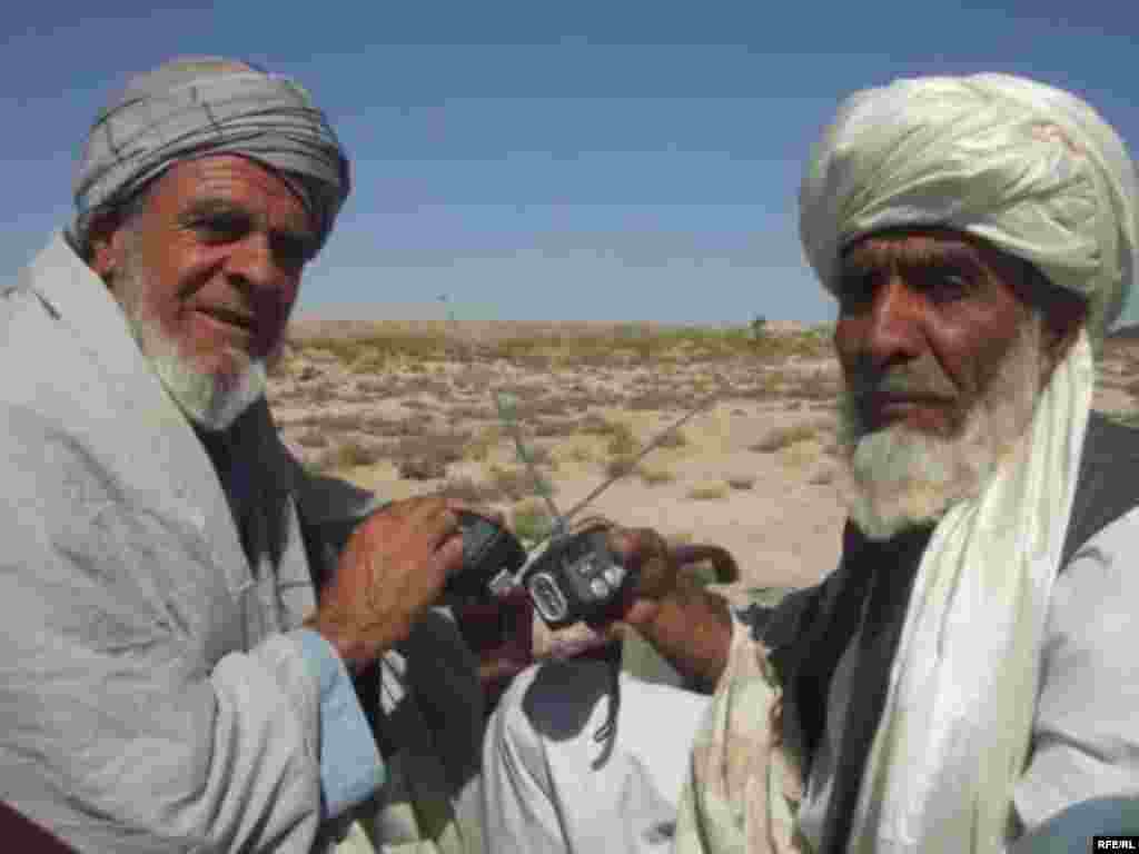...2 men in Farah, where 800 radios were handed out...