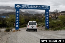 A van drives along the first section of a highway connecting the city of Bar on Montenegro's Adriatic coast to landlocked neighbor Serbia, near the village of Bioce, north of the capital, Podgorica.