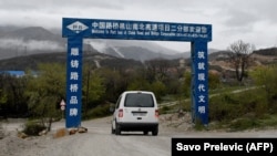 A van drives along the first section of a highway connecting the city of Bar on Montenegro's Adriatic coast to landlocked neighbor Serbia, near the village of Bioce, north of the capital, Podgorica.