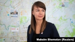 Ksenia Fadeyeva poses for a portrait in a local campaign office in Tomsk in September 2020.