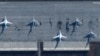 Ілюстраційне фото. Аеродром стратегічної авіації Росії в місті Енгельсі Саратовської області, який, як повідомили, був атакований українським дроном. Супутниковий знімок компанії Maxar Technologies, датований 3 грудням 2022 року