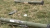 Nagorno-Karabakh - Rocket-propelled grenade launchers and a rifle magazine allegedly left behind by Azerbaijani forces in a gun battle with Karabakh Armenian forces, 19Mar2015.