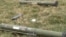 Nagorno-Karabakh - Rocket-propelled grenade launchers and a rifle magazine allegedly left behind by Azerbaijani forces in a gun battle with Karabakh Armenian forces, 19Mar2015.