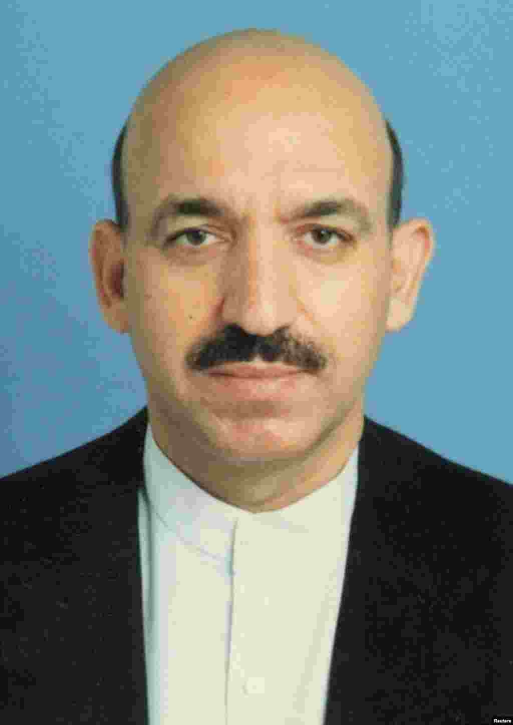 A mustachioed&nbsp;Karzai&nbsp;in&nbsp;a&nbsp;2001 file photo, shortly&nbsp;before he was named on December 5&nbsp;of that year&nbsp;as chaiman of the Afghan interim&nbsp;administration&nbsp;during a UN-sponsored conference&nbsp;in Bonn, Germany. 