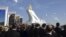 People attend the inauguration of a gilded equestrian statue of Turkmen President Gurbanguly Berdymukhammedov in Ashgabat in May 2015. 