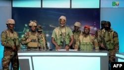 Выступление мятежных офицеров, переданное в эфир государственной Корпорацией телерадиовещания Бенина . 7 декабря 2025 года