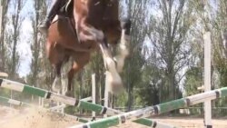 Young Kyrgyz Equestrians Jump Obstacles In Expensive Sport