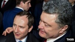 Президент України Петро Порошенко (праворуч) та Ігор Райнін. Архівне фото