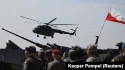 Sjedište EUMAM-a bit će u Poljskoj. (na fotografiji poljski helikopter Mi-8 toko mvojne vježbe NATO trupa dok traje ruska invazije na Ukrajinu, vojni poligon Bemowo Piskie, Poljska, maj 2022).