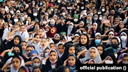 Iranian schoolchildren perform the song Salute Commander, a religious pop song promoted by the clerical establishment, in Isfahan on May 6. (video grab)