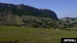 Shushi/Susa is perched above the cliffs that tower over the village of Karintak/Dasalti in Nagorno-Karabakh.