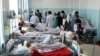 AFGHANISTAN -- Wounded people receive treatment in a hospital after a powerful bomb blast in Kabul, Afghanistan, Monday, July 1, 2019.