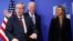 European Commission President Jean-Claude Juncker (left) and EU foreign-policy chief Federica Mogherini (right) meet with U.S. Vice President Joe Biden in Brussels last month.
