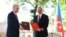 Turkish President Recep Tayyip Erdogan (left) and Azerbaijani President Ilham Aliyev attend a signing ceremony in Susa/Shushi in Nagorno-Karabakh on June 15.