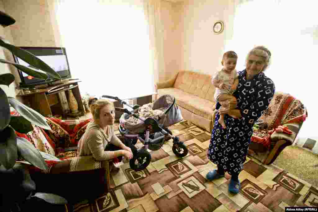 Nine people from four generations live in the Kalayzhan house. The youngest in the house is ten-month-old Karina.