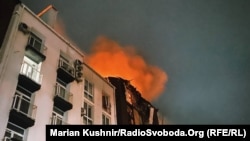 The aftermath of a Russian drone strike on a Kyiv apartment building on January 28