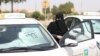 Saudi Arabia-Trainee Amira Abdelgader gets into a car for her driving lesson at Saudi Aramco Driving Center in Dhahran, Saudi Arabia, June 6, 2018. REUTERS/Ahmed Jadallah