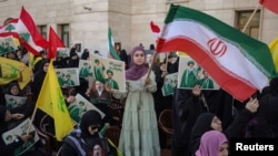 People gather to pay tribute to Iran's late Supreme Leader Ayatollah Ali Khamenei and to show support for new Supreme Leader Mojtaba Khamenei at the Iranian Embassy in Beirut on April 22.