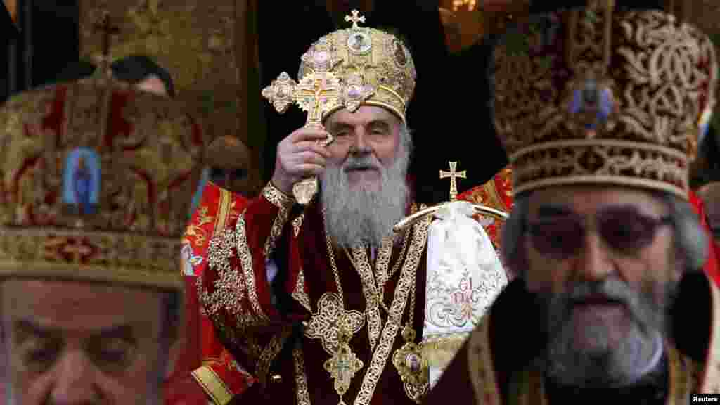 Serbian Patriarch Irinej (center) conducts the liturgy during a ceremony in Banja Luka. (Photo by Ranko Cukovic for Reuters)