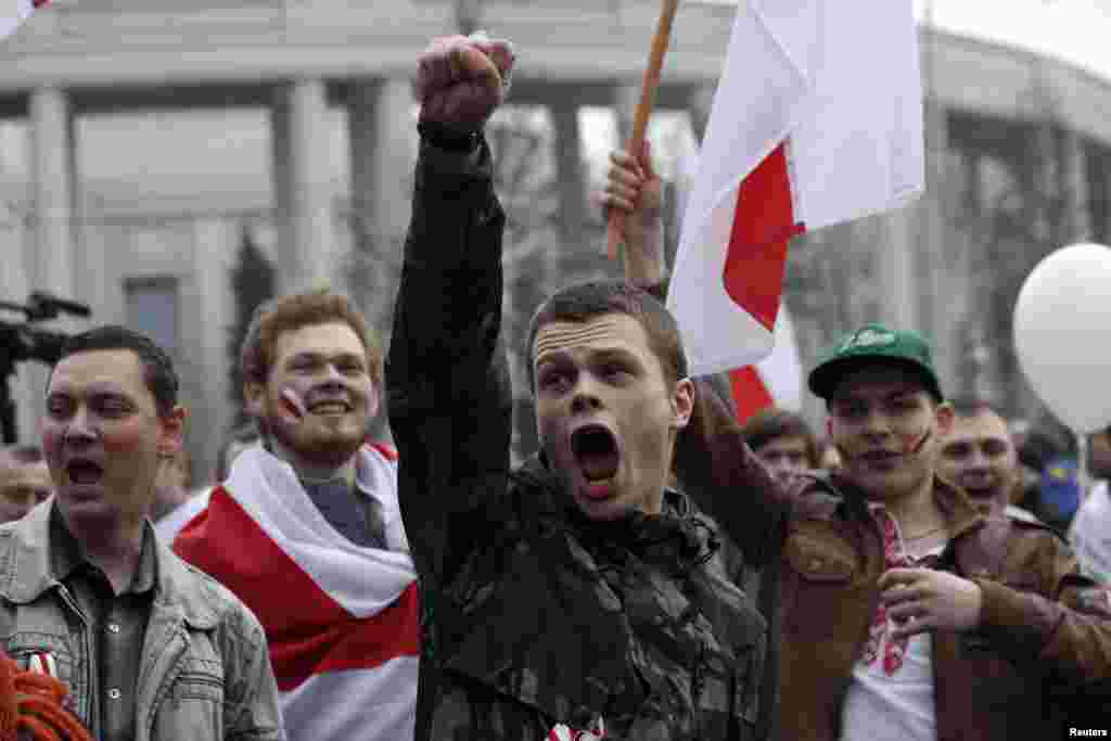 Participants shout slogans during an opposition rally in Minsk, Belarus, on March 25. (Reuters/​Vasily Fedosenko)