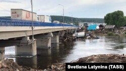 Local authorities said that the floods caused damage to more than 100 towns and villages in the Irkutsk region. 