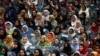 FILE: Afghan women attend a consultative grand assembly or Loya Jirga in Kabul in April 2019.