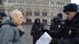 Protester Arrested For Wearing Putin Mask In Red Square