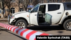 The damaged car in Horlivka, eastern Ukraine, in which Sergei Popov was reportedly wounded. 