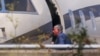 A passenger, believed to be Igor Sechin, boarding a Rosneft-operated Bombardier 6000 aircraft with tail number M-YOIL at Palma de Mallorca airport in 2018