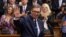 Serbian President Aleksandar Vucic acknowledges the applause during the swearing-in ceremony for a second term in parliament in Belgrade on May 31.