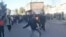 This grab taken on January 2, 2026, from UGC images posted on social media on December 31, 2025, shows protestors attacking a government building in Fasa, in southern Iran on December 31, amidst spontaneous nationwide protests driven by dissatisfaction at