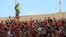 Fans cheer at the AFC Champions League football match at Azadi Stadium in Tehran on October 23, 2018.
