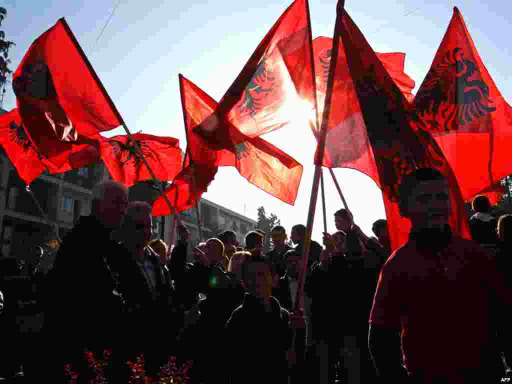 Ethnic Albanians hold Albanian flags in a rally marking Albanian Flag Day in Bujanovac, southern Serbia on November 28. (AFP Photo/Sasa Djordjevic)