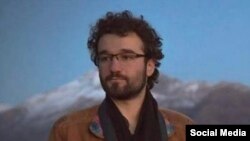 د تصویري هنرونو نړیوال فدراسیون غړی او د مېډل ایست امېجس اژانس فوټو ژورنالېست ابراهیم علي‌پور