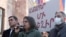 Karin Tonoyan (C), leader of the “5165” opposition movement, addresses a rally in front of the central government office in Yerevan, Armenia, November 22, 2021.