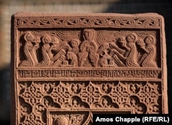 A detail of the top of a khachkar carved in Julfa in the 1600s. It is now on display in Echmiadzin, near Yerevan.