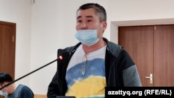 Activist Orynbai Oqasov in court on November 16.