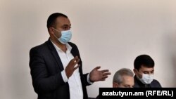 Yazidi human rights activist Sashik Sultanian (L) goes on trial in Armenia, November 24, 2021.