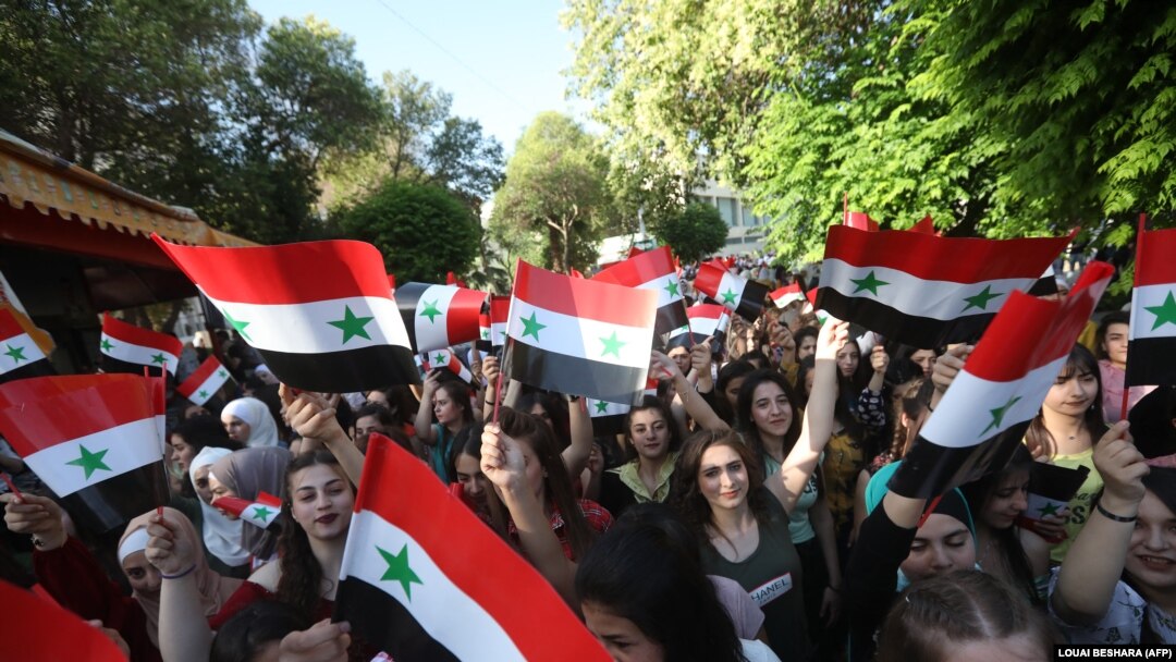 Sirienii s-au strâns cu miile să îl realeagă pe Assad.