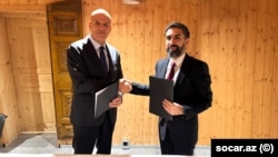 Klaudio Deskaltsi və Rövşən Nəcəf