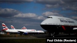 Британиянын British Airways компаниясынын учактары. Иллюстрация сүрөт.