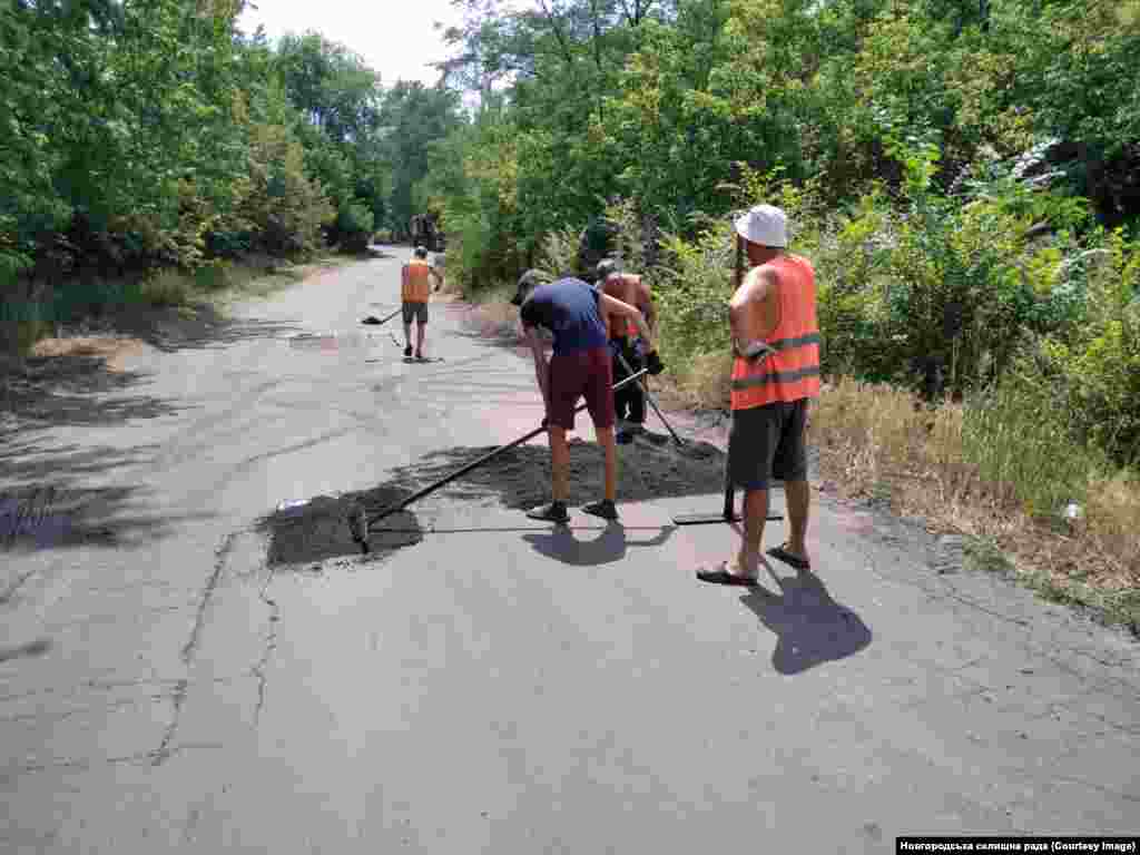 A work crew smoothing out a road in Novhorodske. &nbsp; Shevchenko says locals&rsquo; hopes are high that the anticipated name change will boost the fortunes of her beloved hometown. &nbsp; &nbsp; &nbsp;