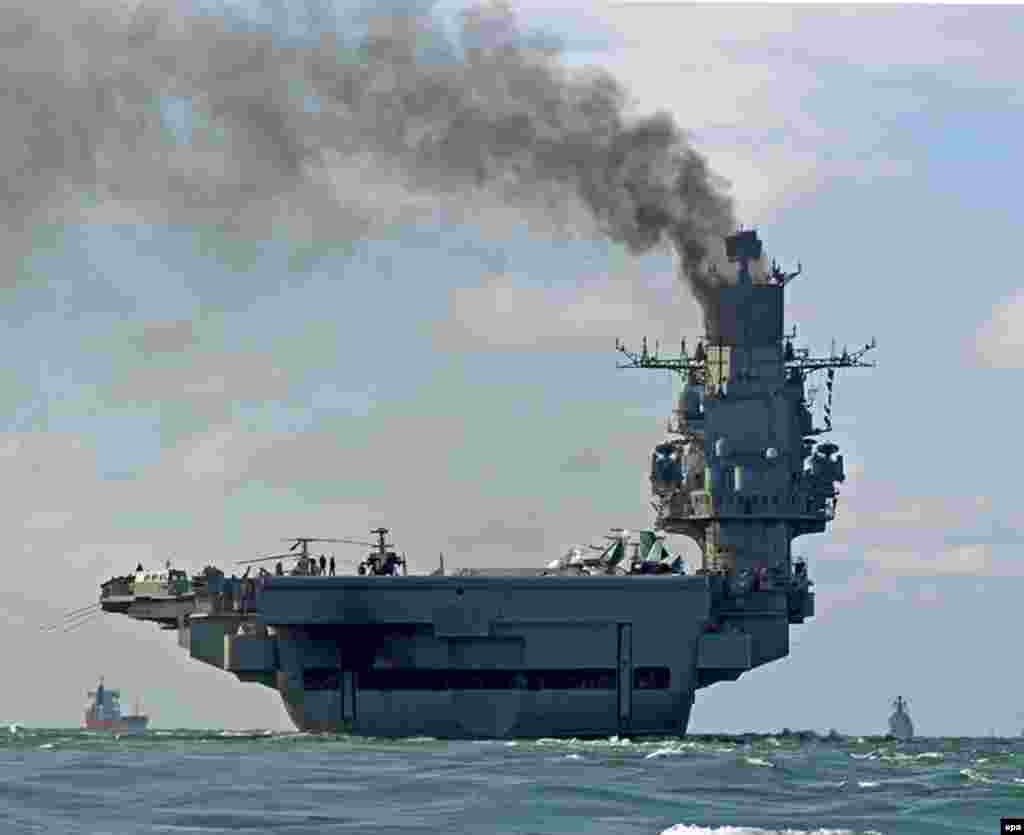 The 305-meter Admiral Kuznetsov passing within sight of the white cliffs of Dover on October 21. The mission to the Syrian coast of the eastern Mediterranean will be the first-ever combat operation for this troubled relic of the Soviet Union.