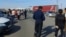 Kazakhstan - People and cars on the border of the Aktobe region of Kazakhstan with the Orenburg region of Russia. 22Sep2022