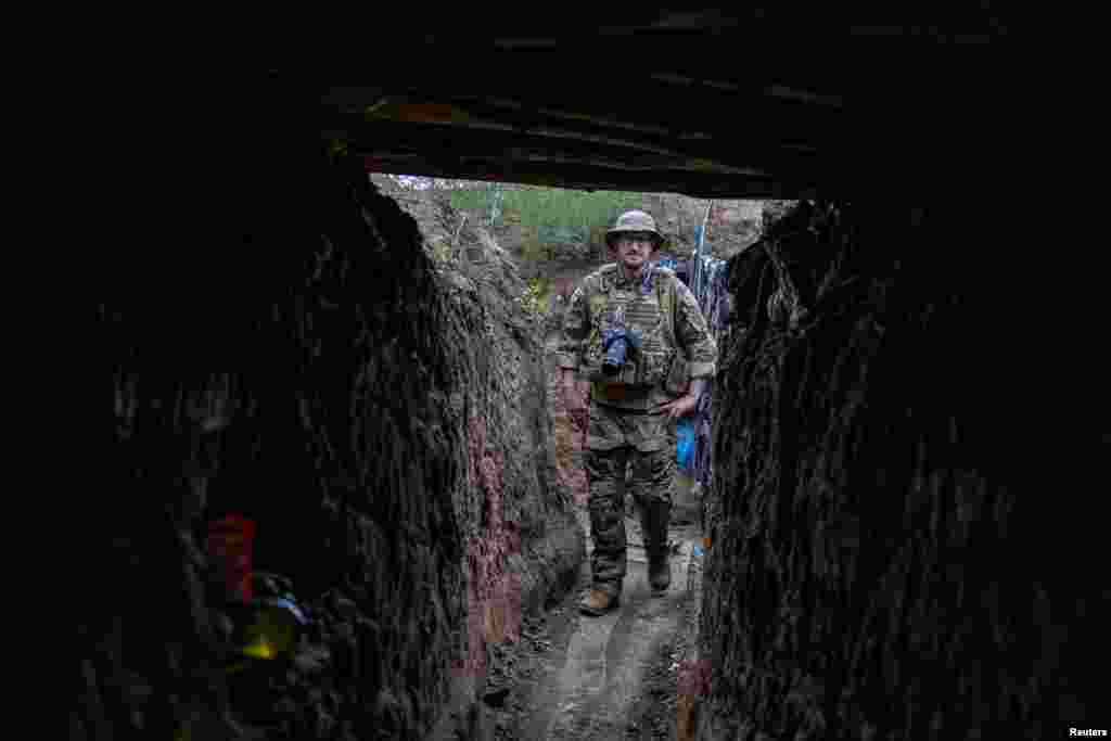 Andre inspects a defensive trench.