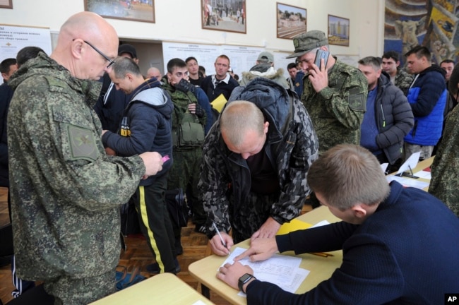 Russian recruits gather at a military recruitment center in Bataysk, Rostov-on-Don region, Russia, on September 26, 2022.